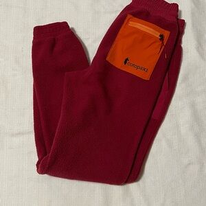 Cotopaxi Red Fleece Pants with Orange Pocket